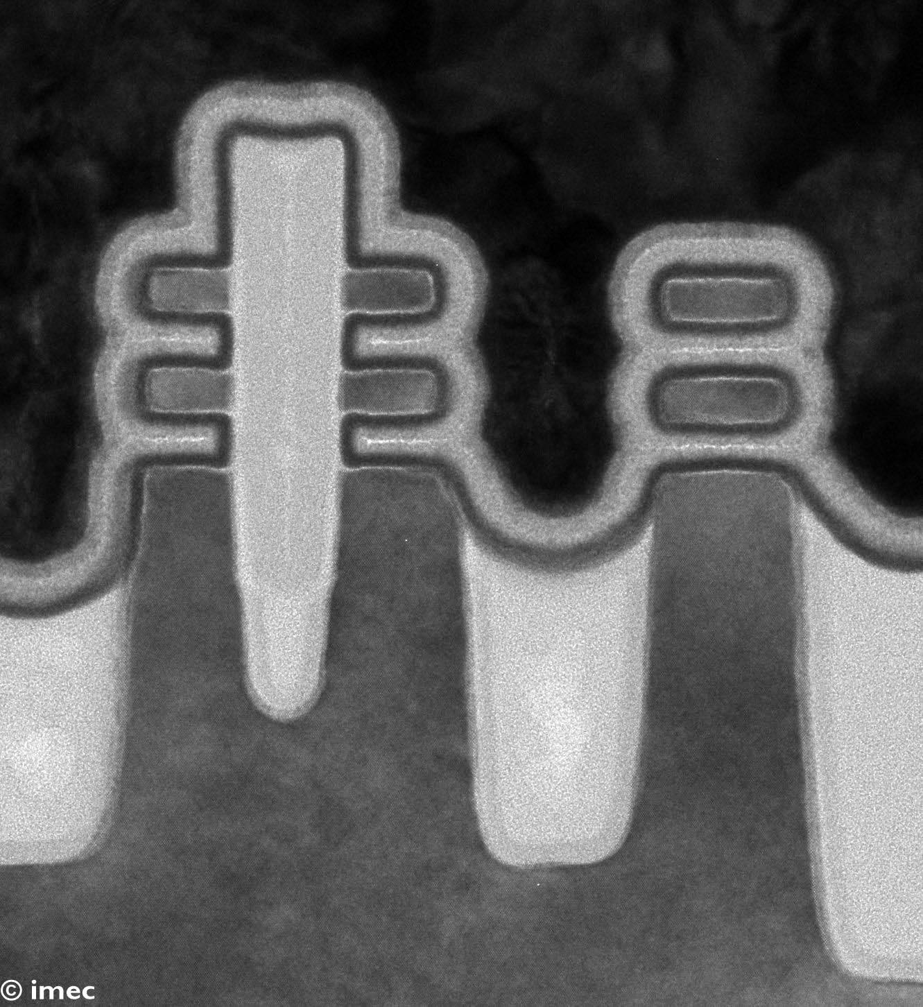 TEM image of co-integrated fork- and nanosheet FETs. For the forksheet n-and pFETs, a dual work function metal gate is integrated at 17nm n-p space. 