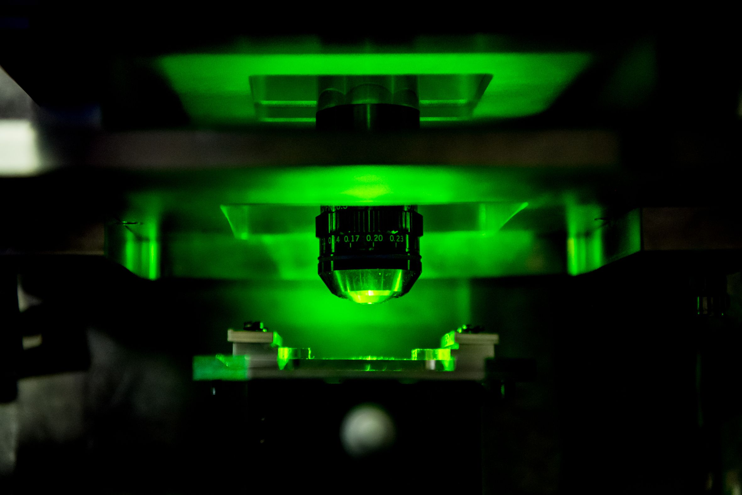 Researchers at IMO-IMOMEC have created electrically readable qubits out of artificial diamond. The photographs show a diamond quantum device mounted on a microwave (MW) board for qubit addressing under pulsed green laser illumination providing spin initialization.